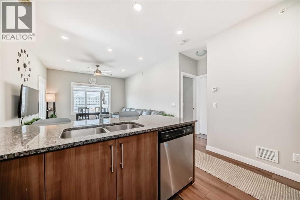 313, 20 sage hill Terrace NW — photo 5