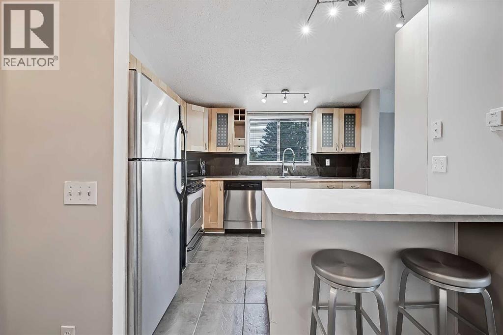 309, 1605 16 Avenue SW — photo 11