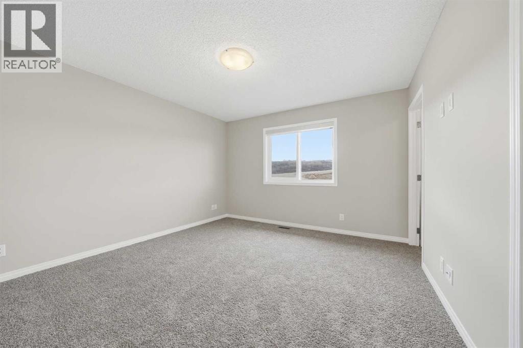 831 Wolf Willow Boulevard SE — photo 20
