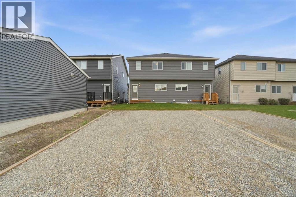 831 Wolf Willow Boulevard SE — photo 40