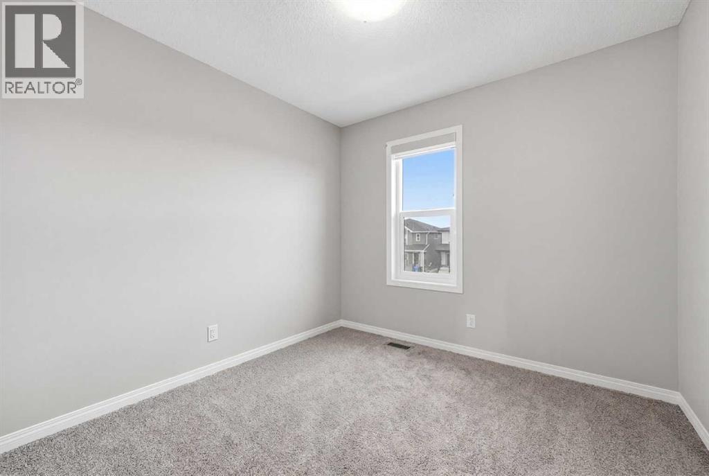 831 Wolf Willow Boulevard SE — photo 28
