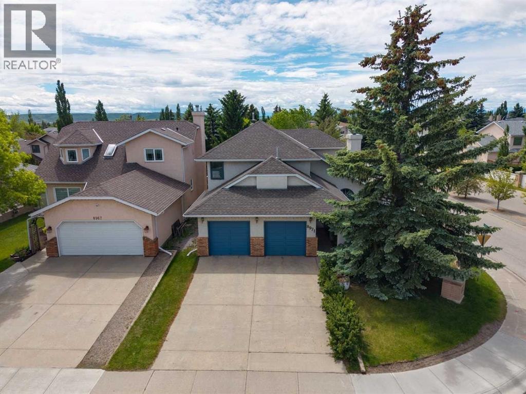 8971 SCURFIELD Drive NW — photo 41