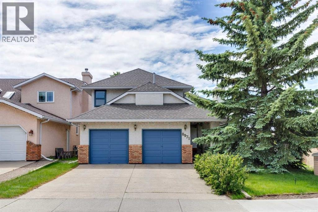 8971 SCURFIELD Drive NW — photo 1