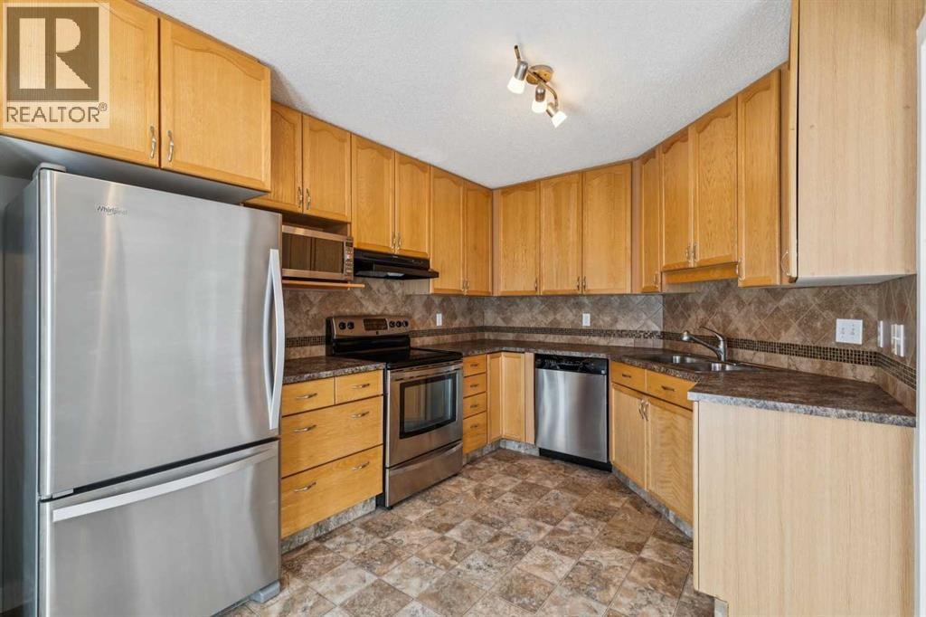 1213, 1213 Sienna Park Green SW — photo 14
