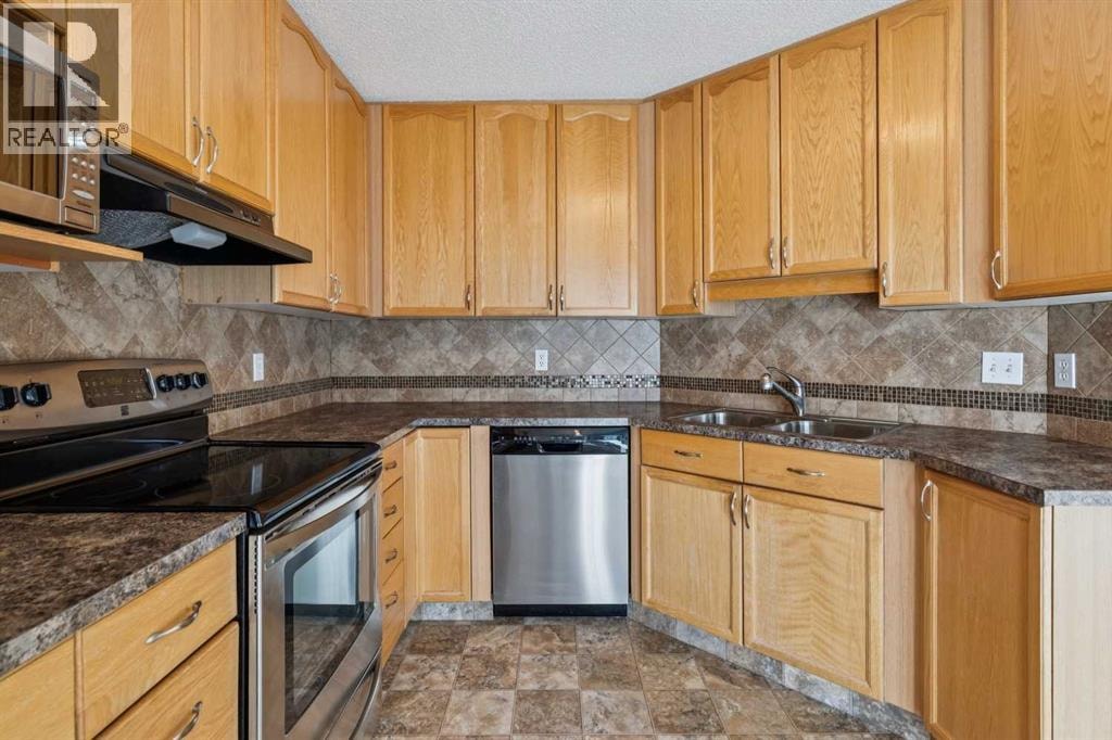 1213, 1213 Sienna Park Green SW — photo 15
