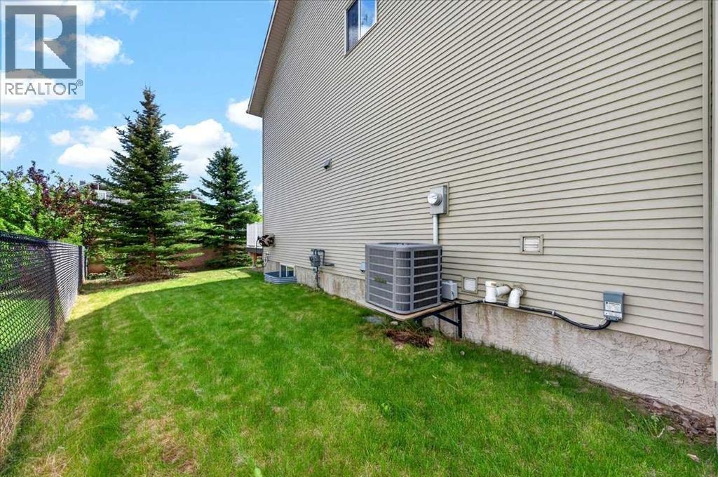 18 Cougarstone Bay SW — photo 47