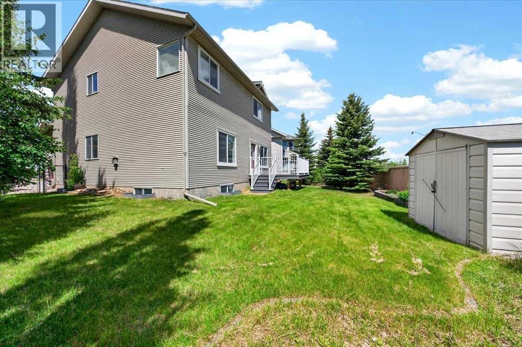 18 Cougarstone Bay SW — photo 46