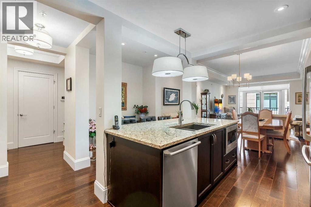 104, 221 Quarry Way SE — photo 3