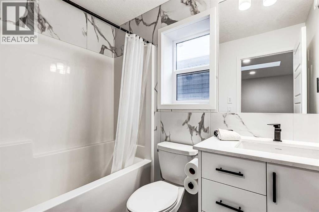 184 Rowmont Boulevard NW — photo 32