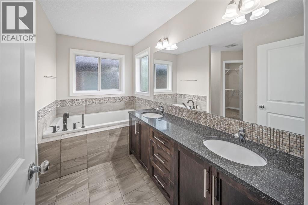 144 Cougar Ridge Manor SW — photo 33