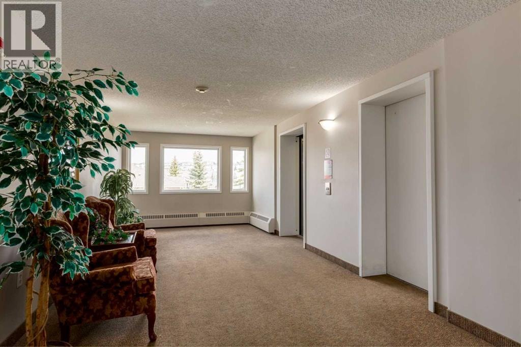 2301, 950 Arbour Lake Road NW — photo 5