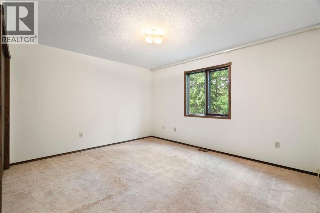 39 Bearspaw Ridge Crescent — photo 29