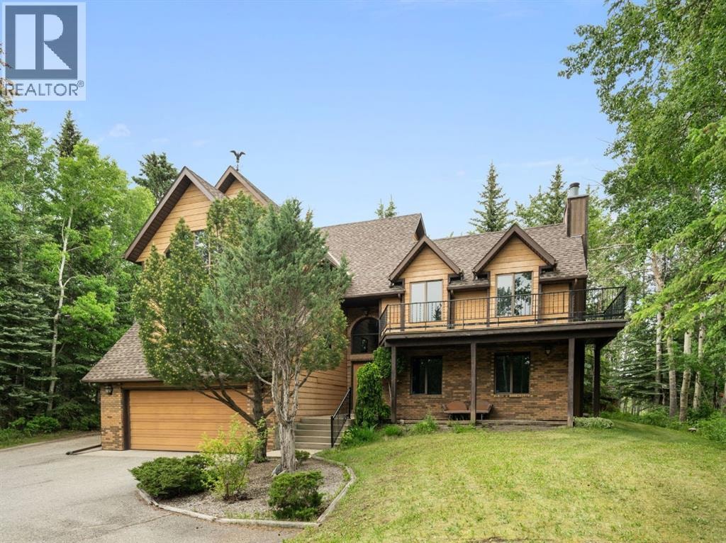 39 Bearspaw Ridge Crescent — photo 2