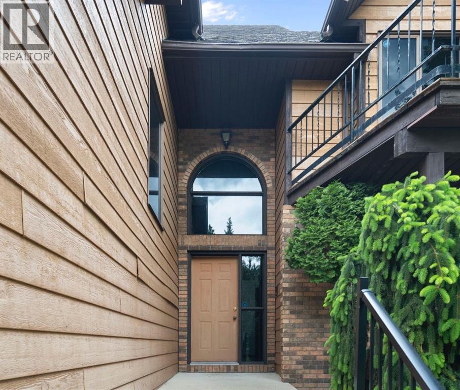 39 Bearspaw Ridge Crescent — photo 3