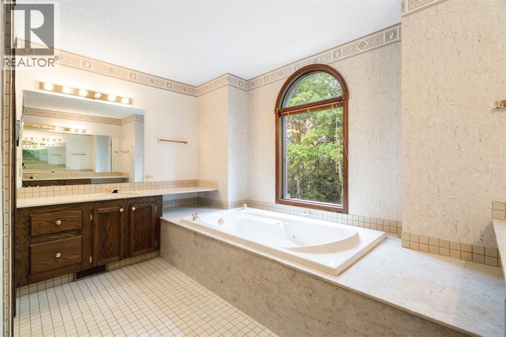 39 Bearspaw Ridge Crescent — photo 33