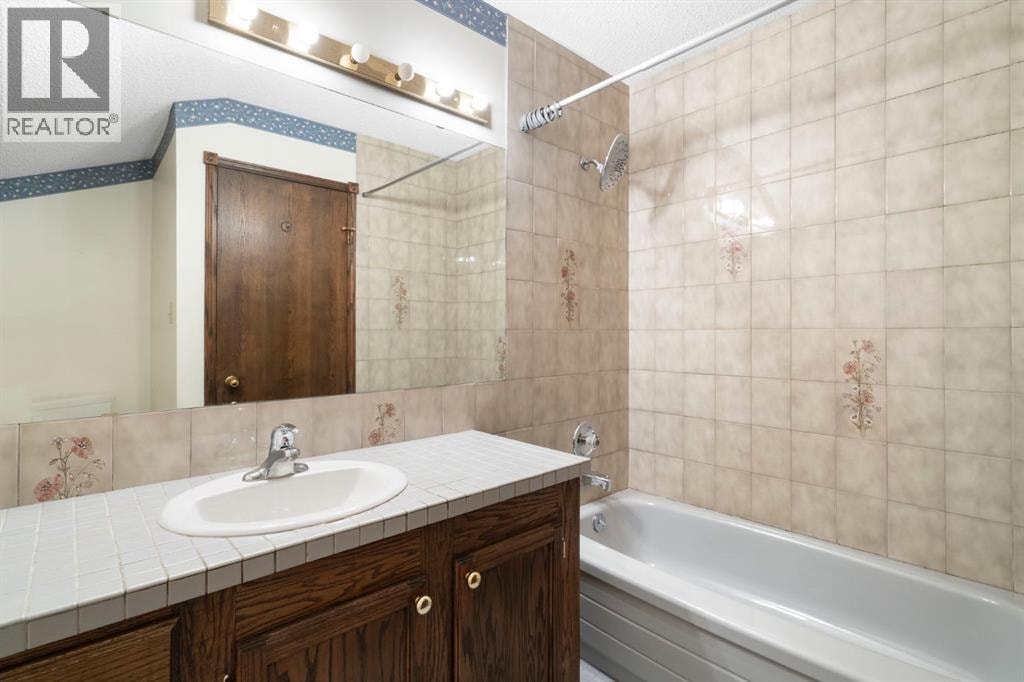39 Bearspaw Ridge Crescent — photo 24