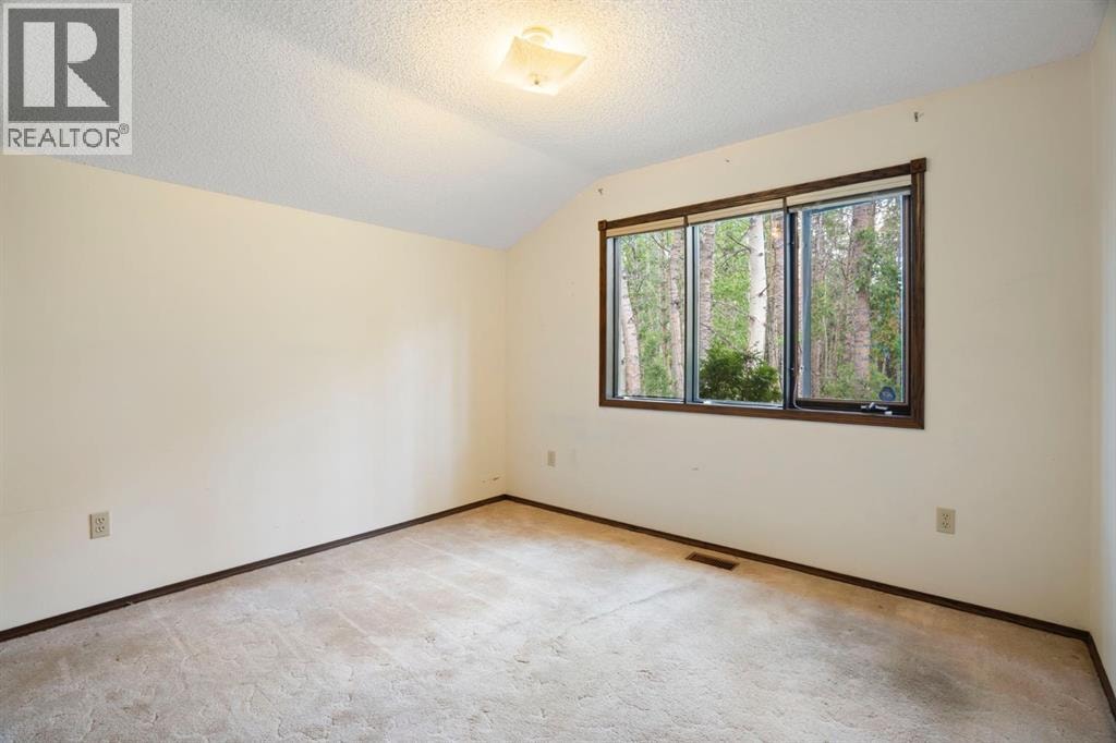 39 Bearspaw Ridge Crescent — photo 25