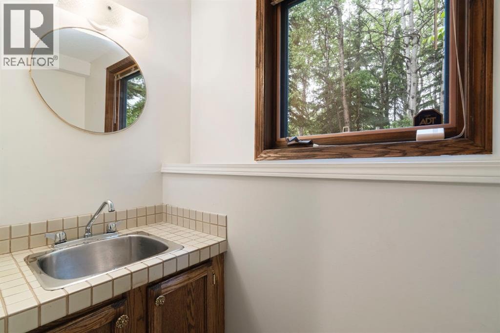 39 Bearspaw Ridge Crescent — photo 37