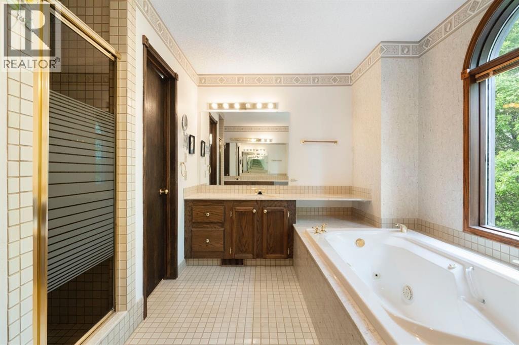 39 Bearspaw Ridge Crescent — photo 34
