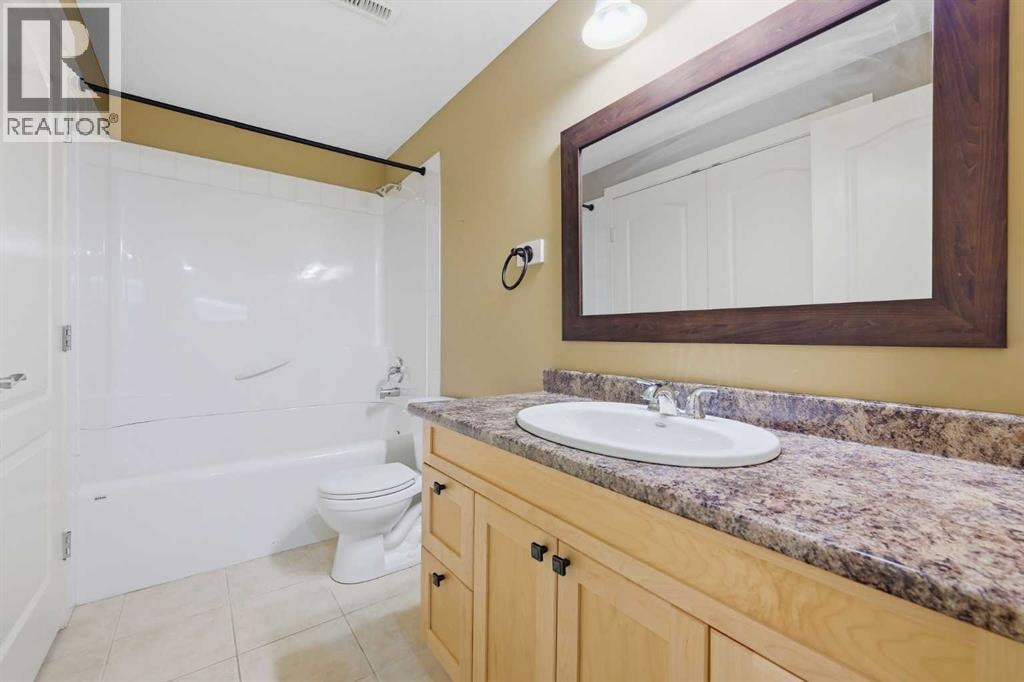 15 Cougarstone Court SW — photo 41