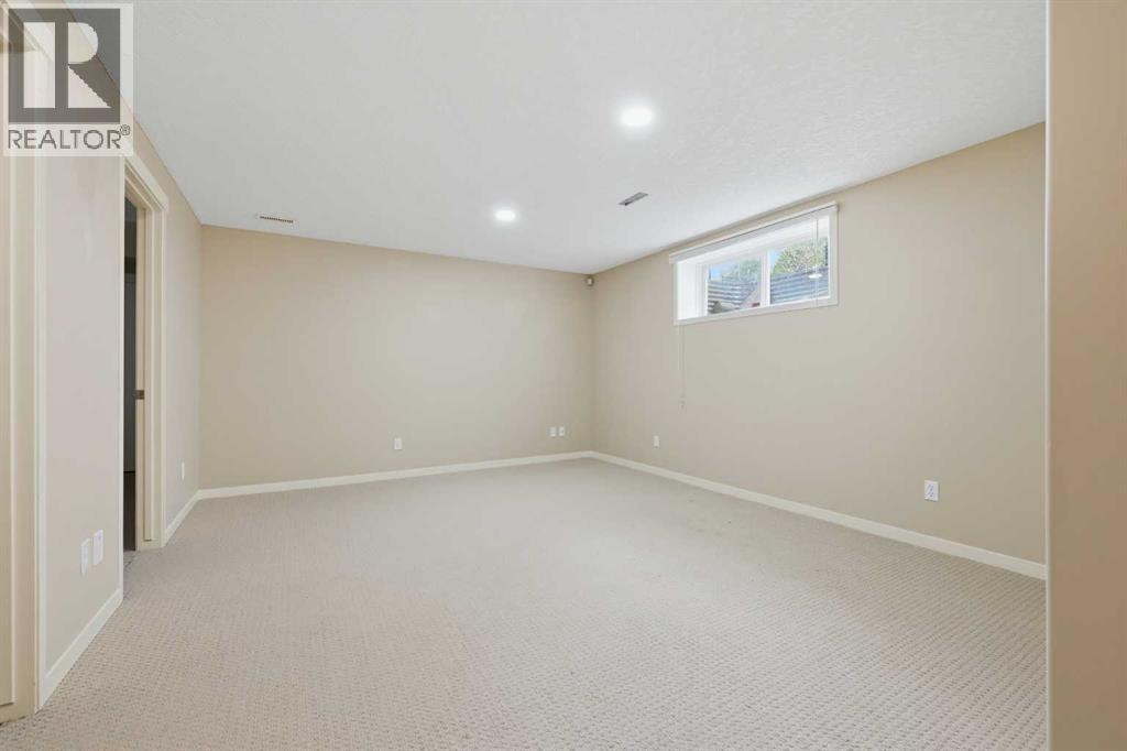 15 Cougarstone Court SW — photo 39