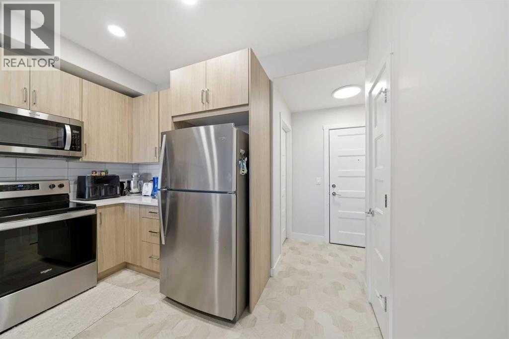 318, 55 wolf hollow Crescent SE — photo 2