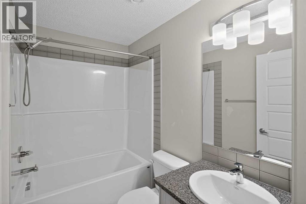 1910, 7451 Falconridge Boulevard NE — photo 22