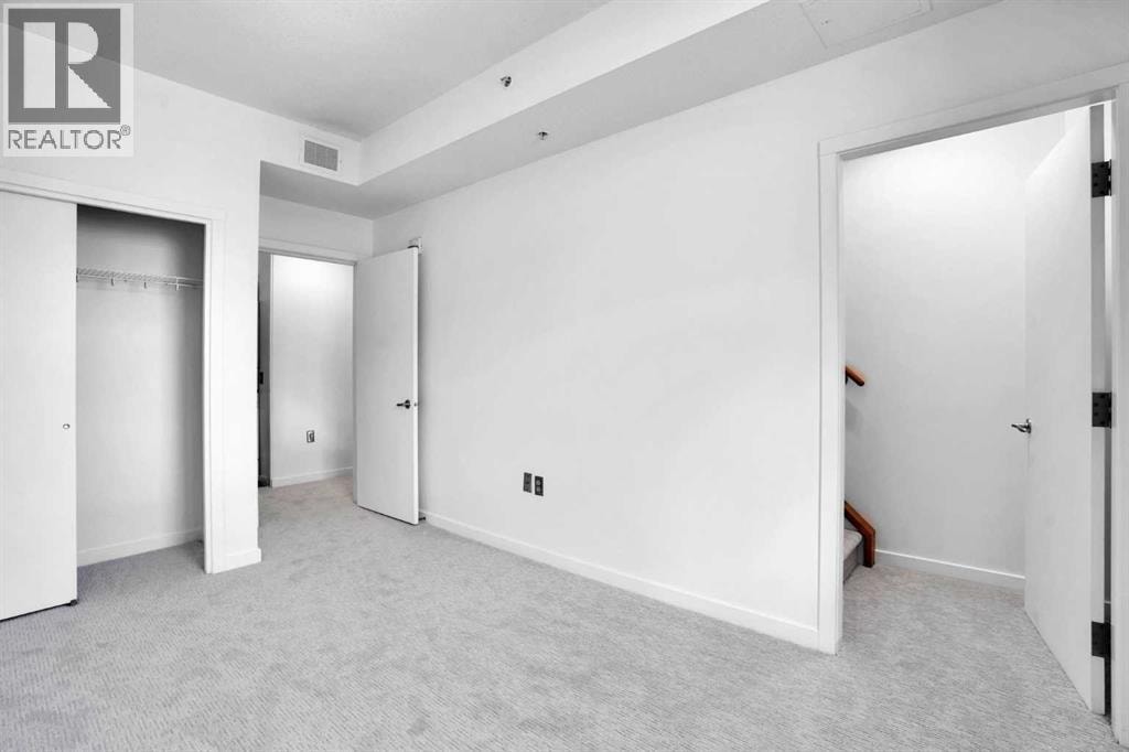 201, 116 7A Street NE — photo 33
