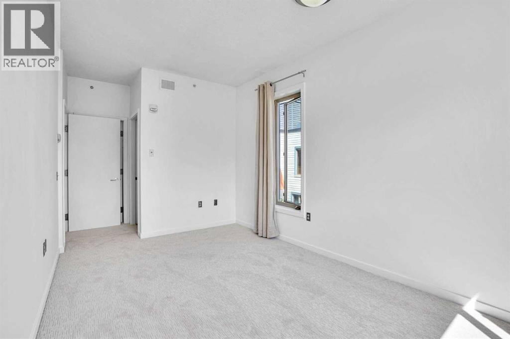 201, 116 7A Street NE — photo 26
