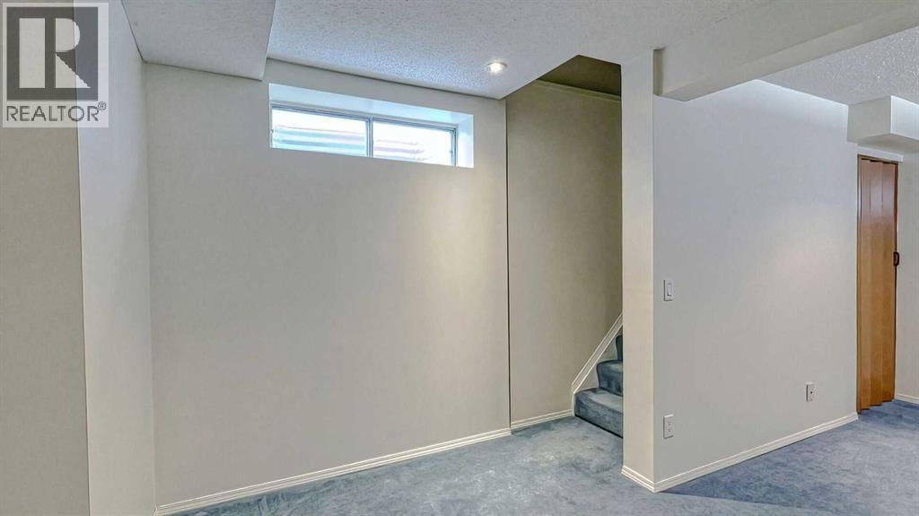 157 Harvest Gold Heights NE — photo 32