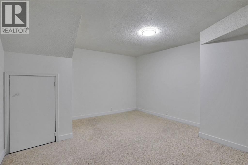 112 Martinglen Close NE — photo 28