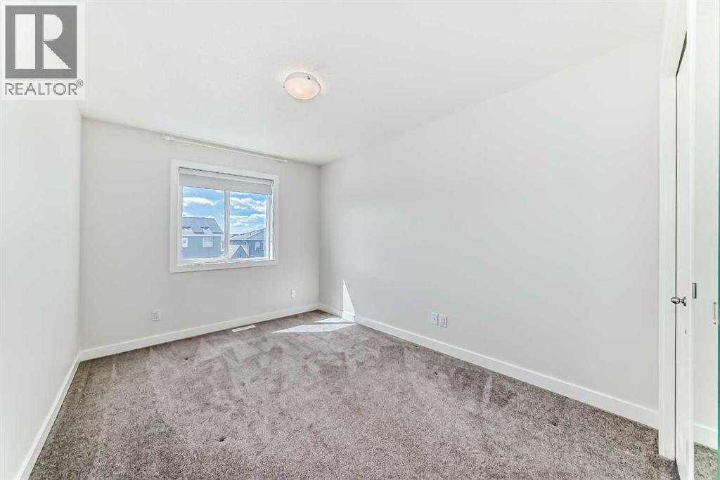 121 Ambleside Heath NW — photo 30