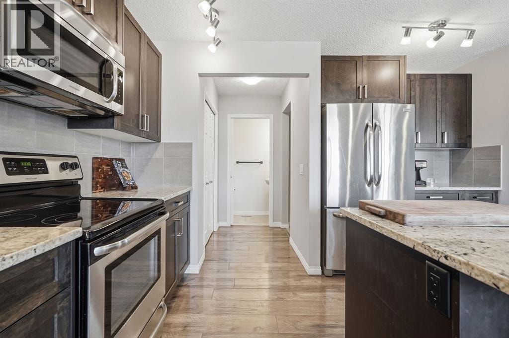 73 Mount Rae Heights — photo 4