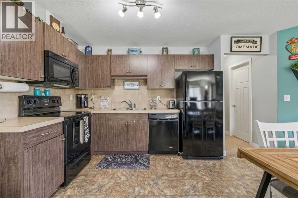 404, 250 Sage Valley Road NW — photo 11