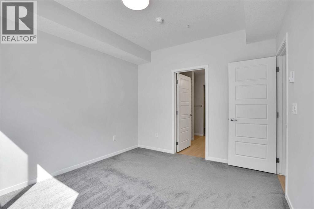 1102, 33 Carringham Gate NW — photo 21