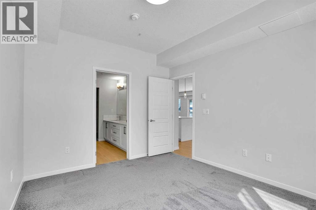 1102, 33 Carringham Gate NW — photo 22