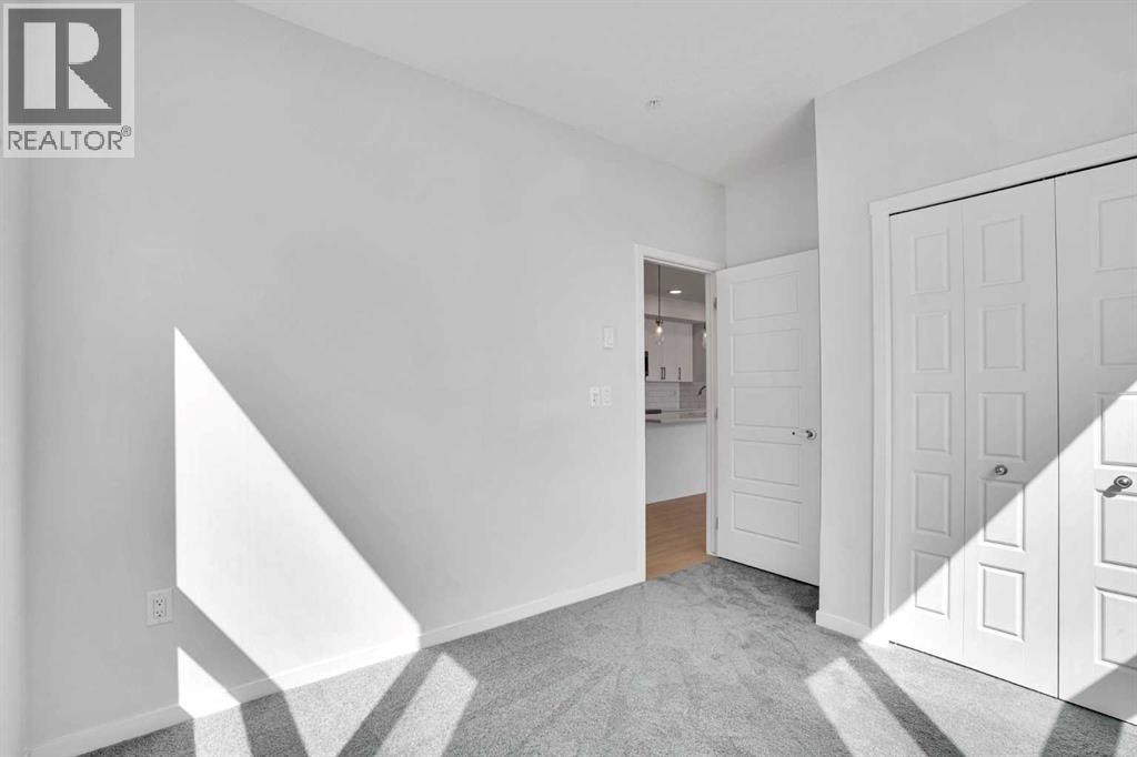 1102, 33 Carringham Gate NW — photo 17