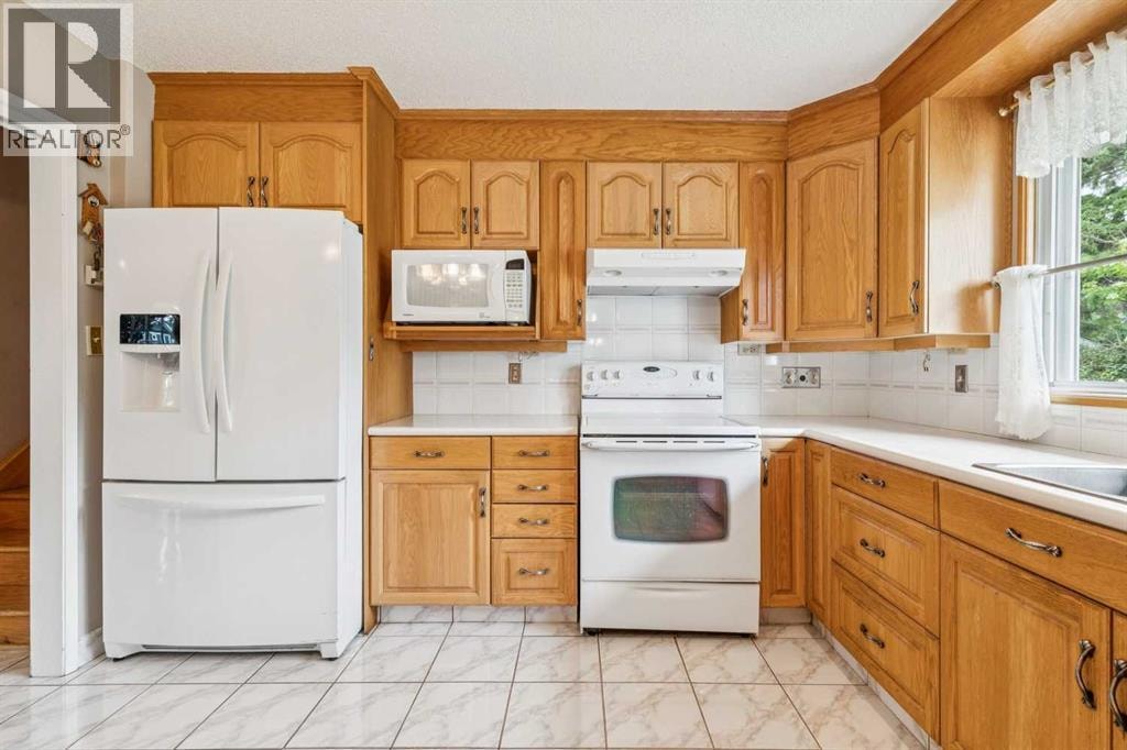 5036 Vallance Crescent NW — photo 11