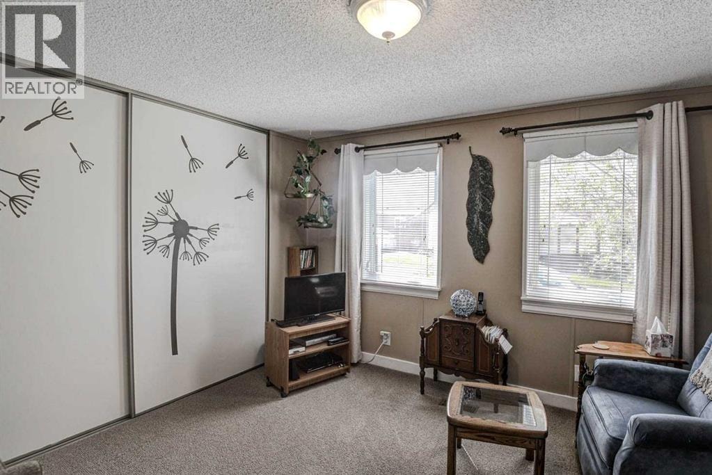 221, 99 Arbour Lake Road NW — photo 11