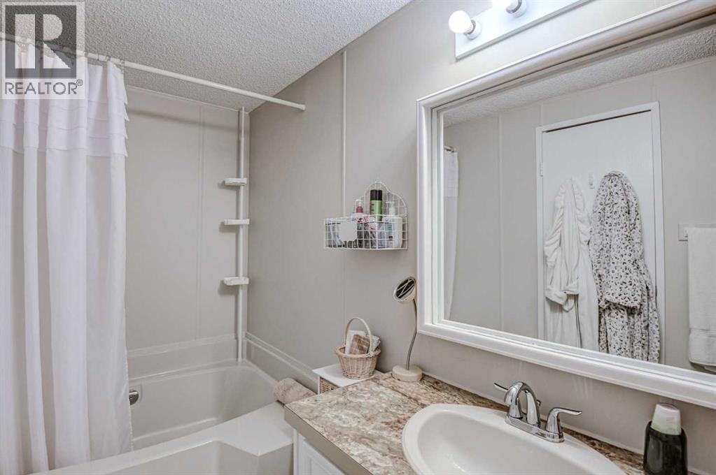 221, 99 Arbour Lake Road NW — photo 19