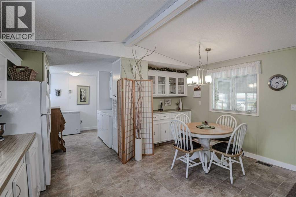 221, 99 Arbour Lake Road NW — photo 6