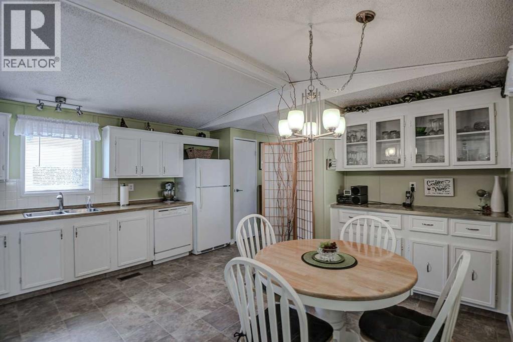 221, 99 Arbour Lake Road NW — photo 5