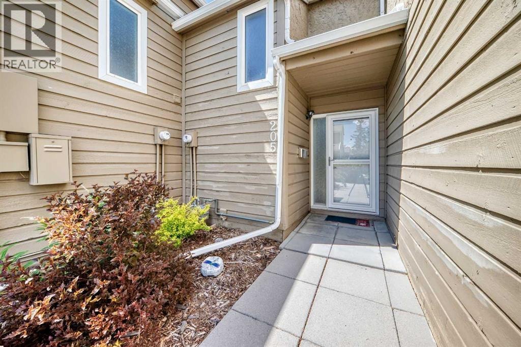 205, 829 Coach Bluff Crescent SW — photo 1