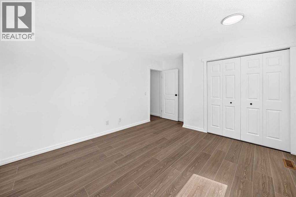 205, 829 Coach Bluff Crescent SW — photo 17