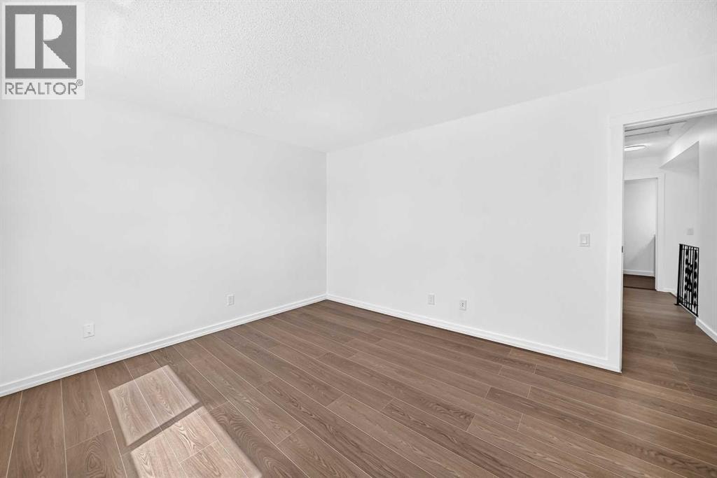 205, 829 Coach Bluff Crescent SW — photo 18