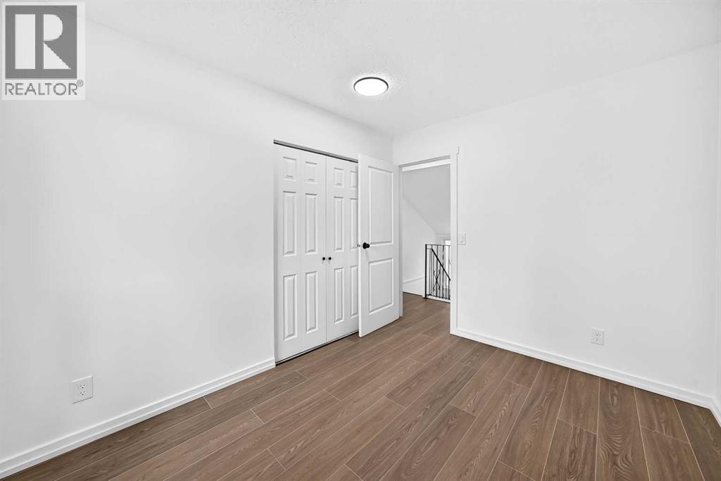 205, 829 Coach Bluff Crescent SW — photo 21