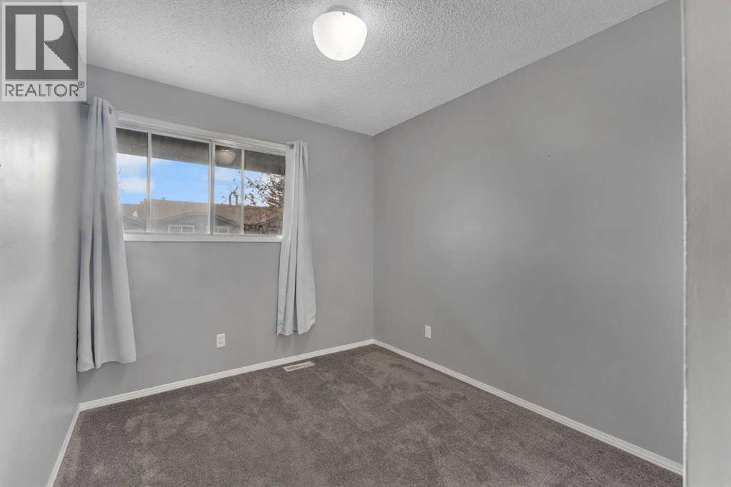 104, 7172 Coach Hill Road SW — photo 24