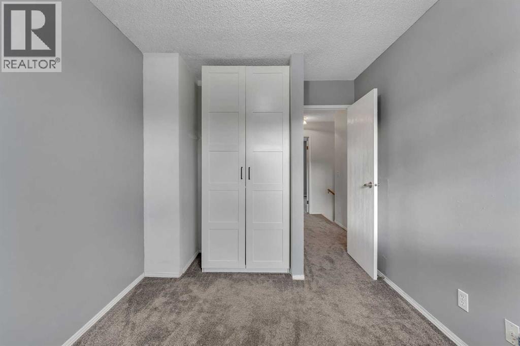 104, 7172 Coach Hill Road SW — photo 25