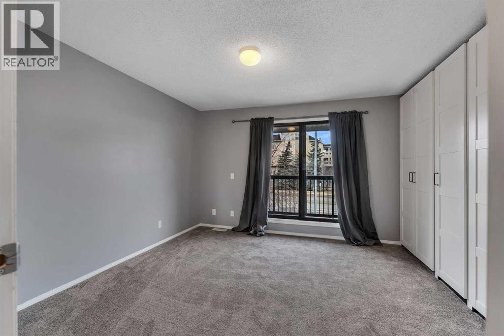 104, 7172 Coach Hill Road SW — photo 16