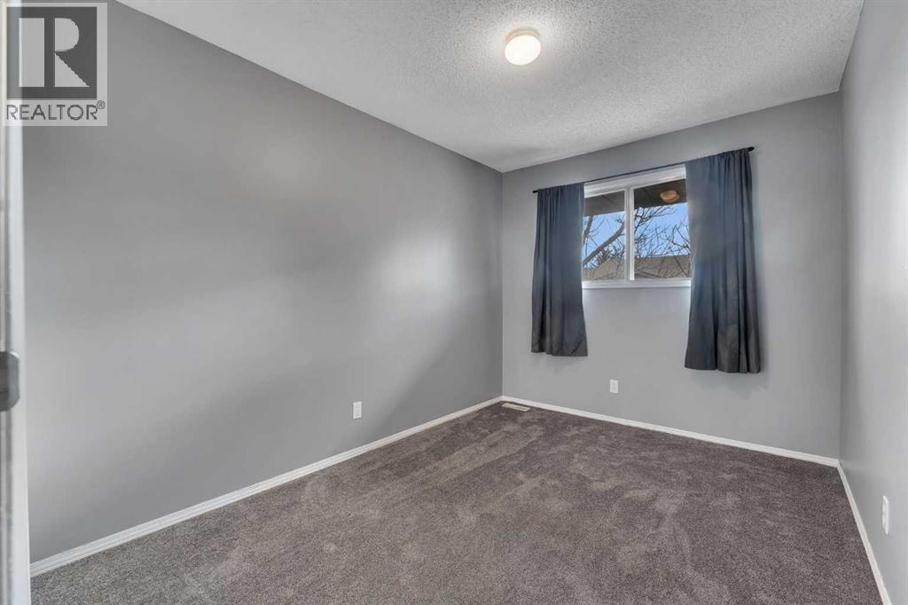 104, 7172 Coach Hill Road SW — photo 26